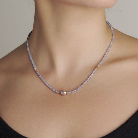 Freya Necklace with Blue Sapphires and Grey Pearls on model 