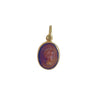 Gold charm with a brownstone featuring a face design on a light gray background