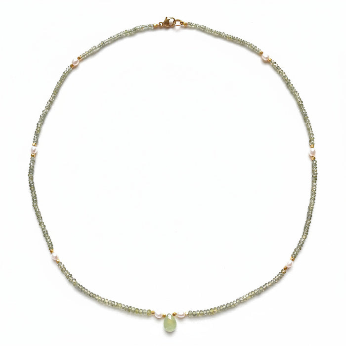 Round green sapphire and pearl beaded necklace on white