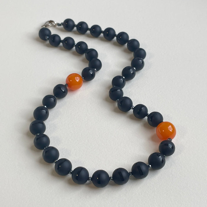 Banded Black Onyx Orbs with Hematite and Resin