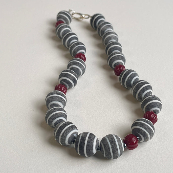 Buffalo Horn, carved Coral, and Hematite Necklace