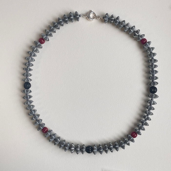 Buffalo Horn, Carved Coral and Onyx, and Hematite Necklace